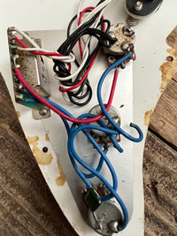 Squier Stratocaster pickups, harness on tortoise pickguard